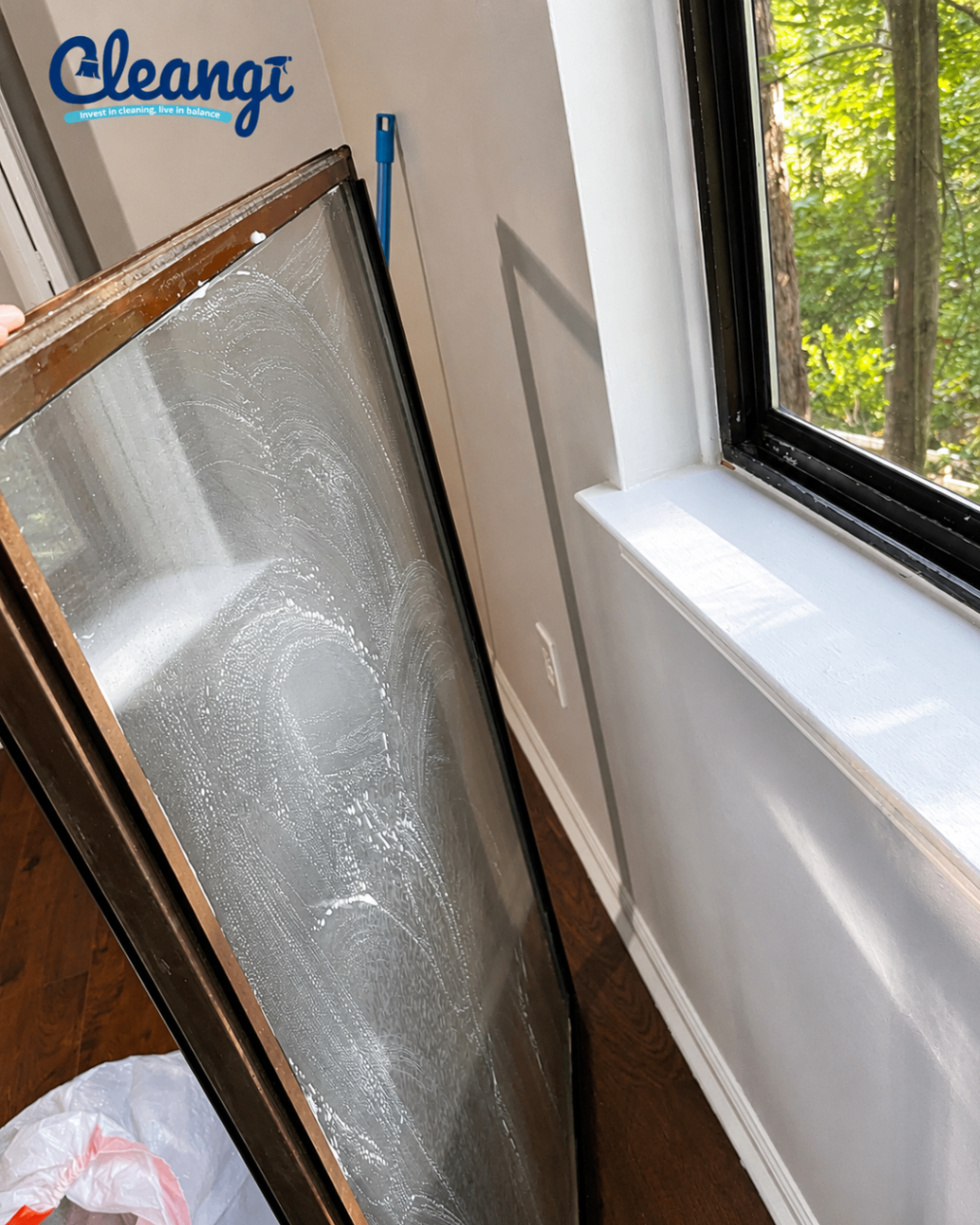 Window glass being cleaned during a Cleangi service