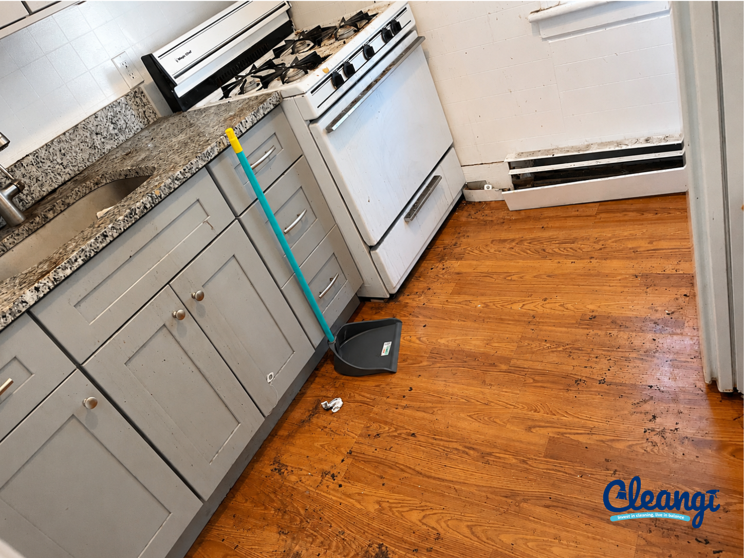 Kitchen with visible debris and buildup before cleaning